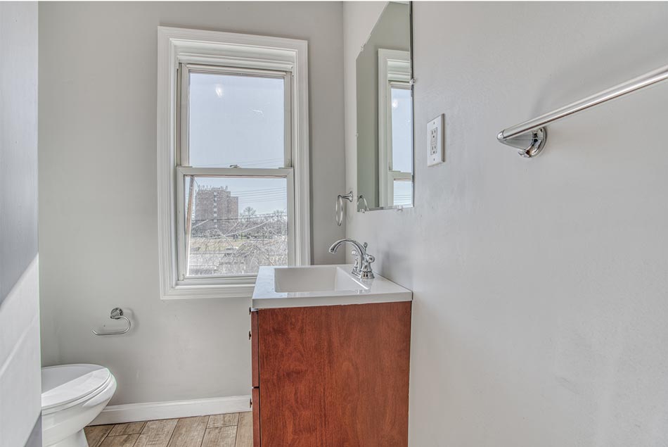 The kitchen before the renovation is outdated and in poor condition